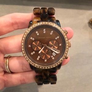 Michael Kors tortoise shell women’s watch, great condition.